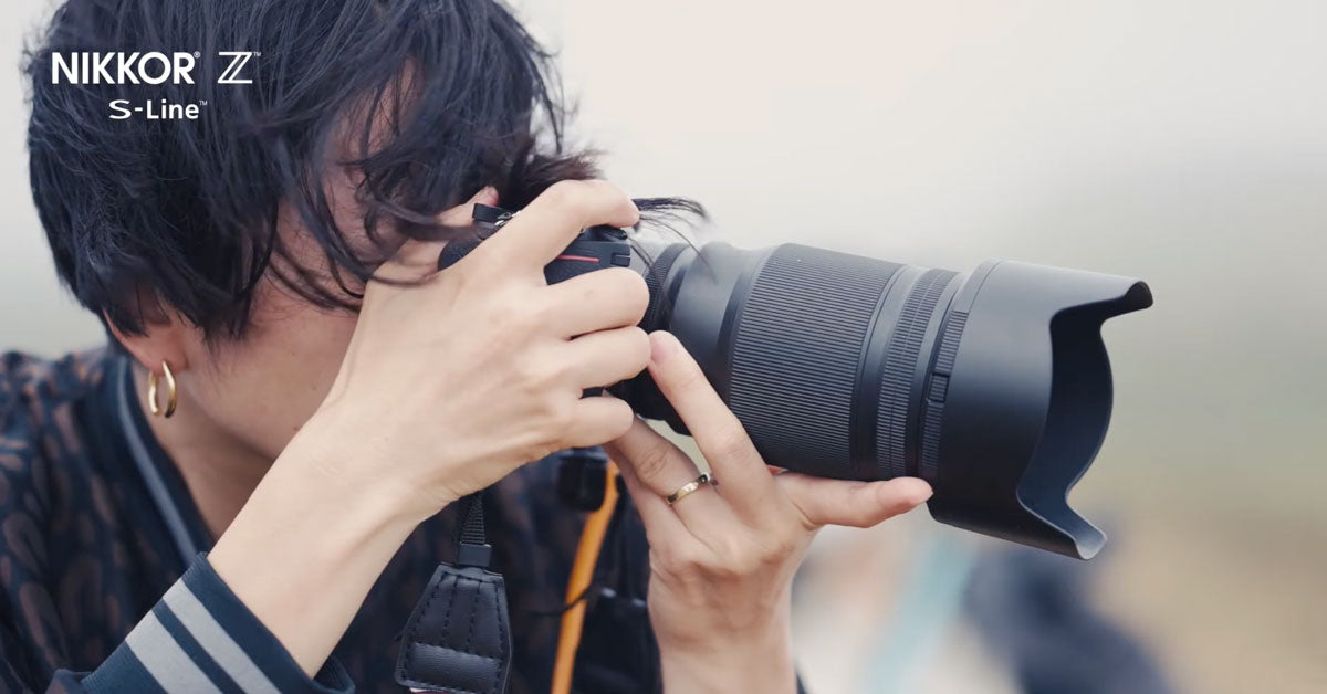 Woman using Nikon Z50mm F1.2 lens