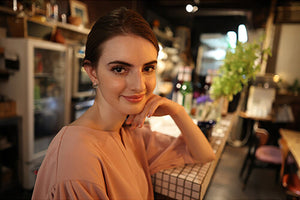 woman sitting at a counter