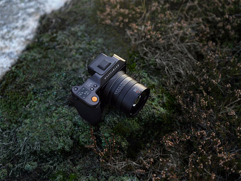 Hasselblad X2D 100C on coastal rocks with moss