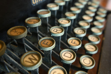 close up bokeh shot of typewriter