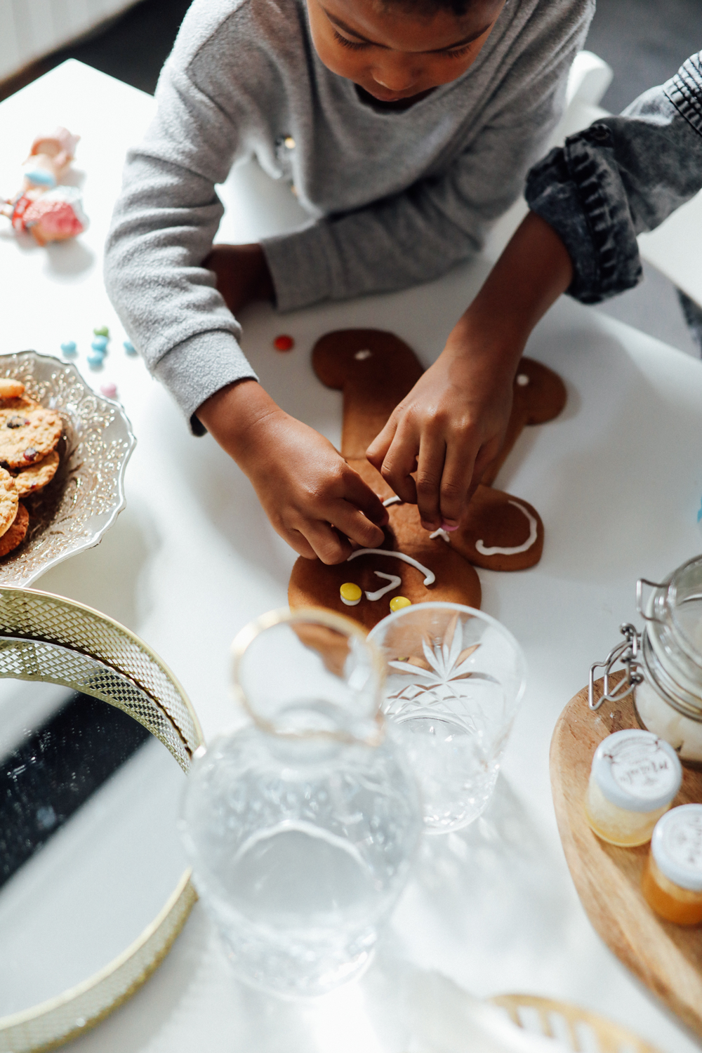 boy making gingerbread cookies