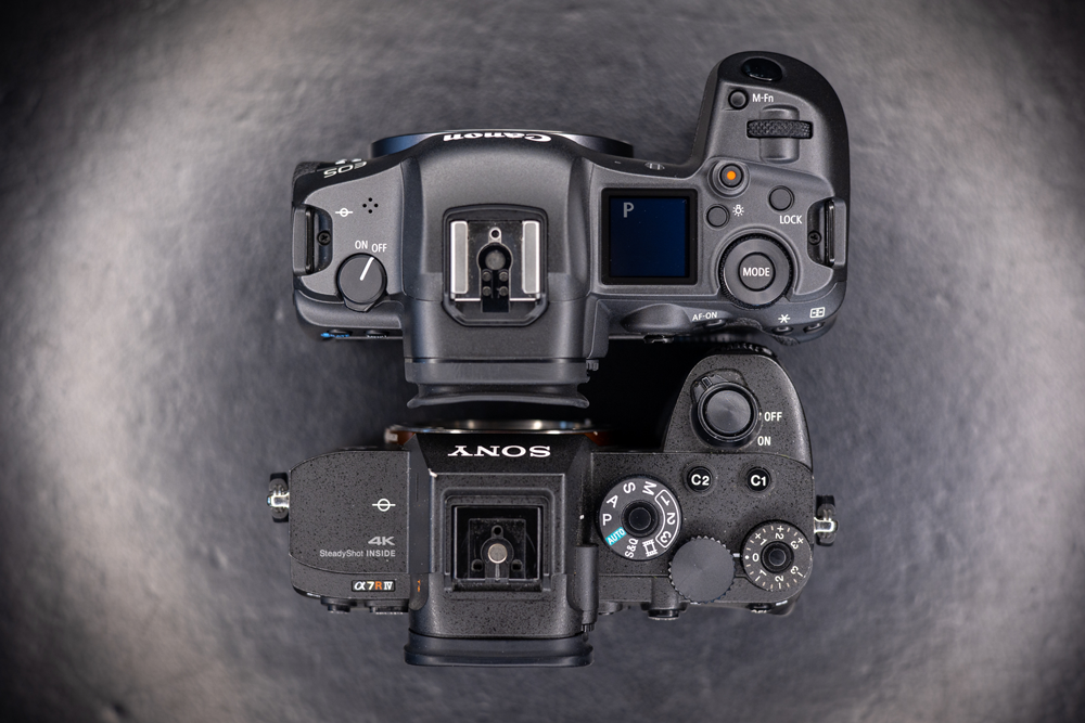 the top of both the canon eos r5 and the sony a7riv
