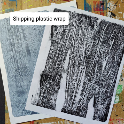 Papers created on a gel printing plate using shrink wrap and acrylic paint.