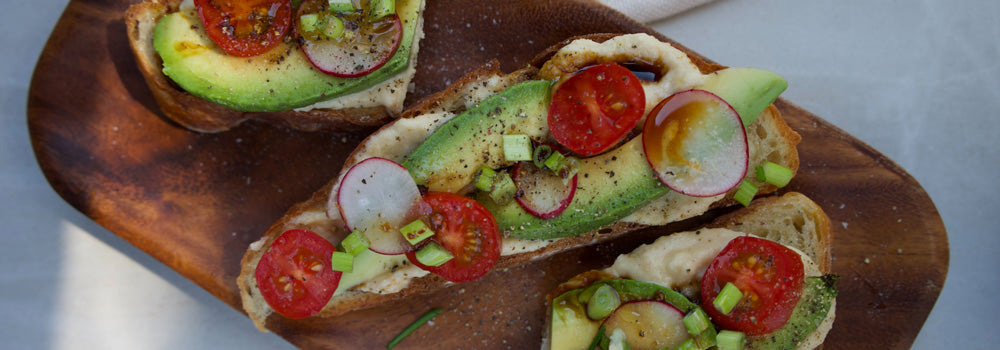 Delicious avocado toast with tomatoes