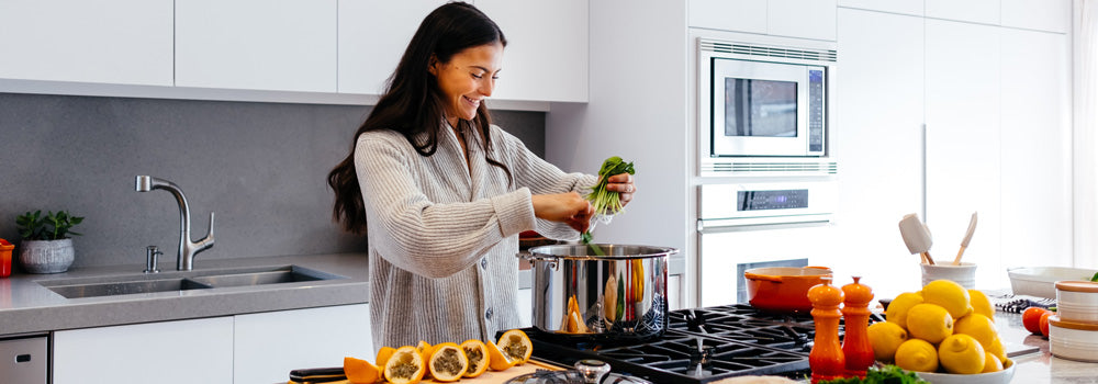 Woman cooking a healthy, nutritious meal.