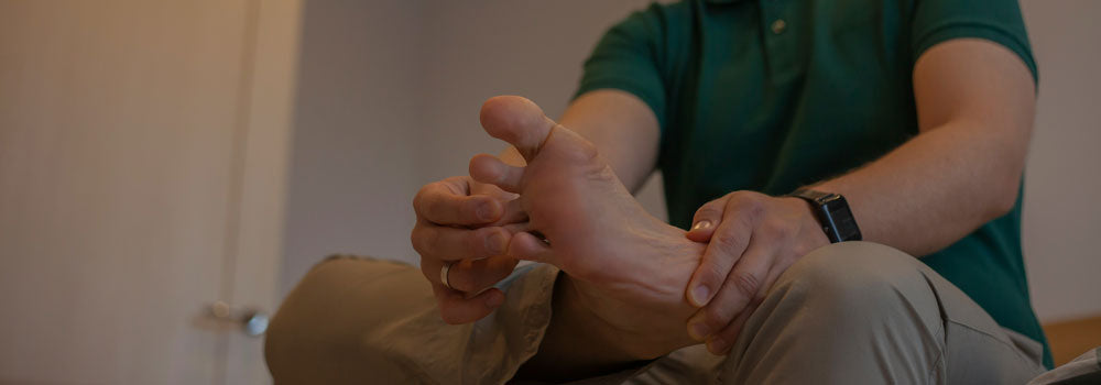 Guy stretching his toes