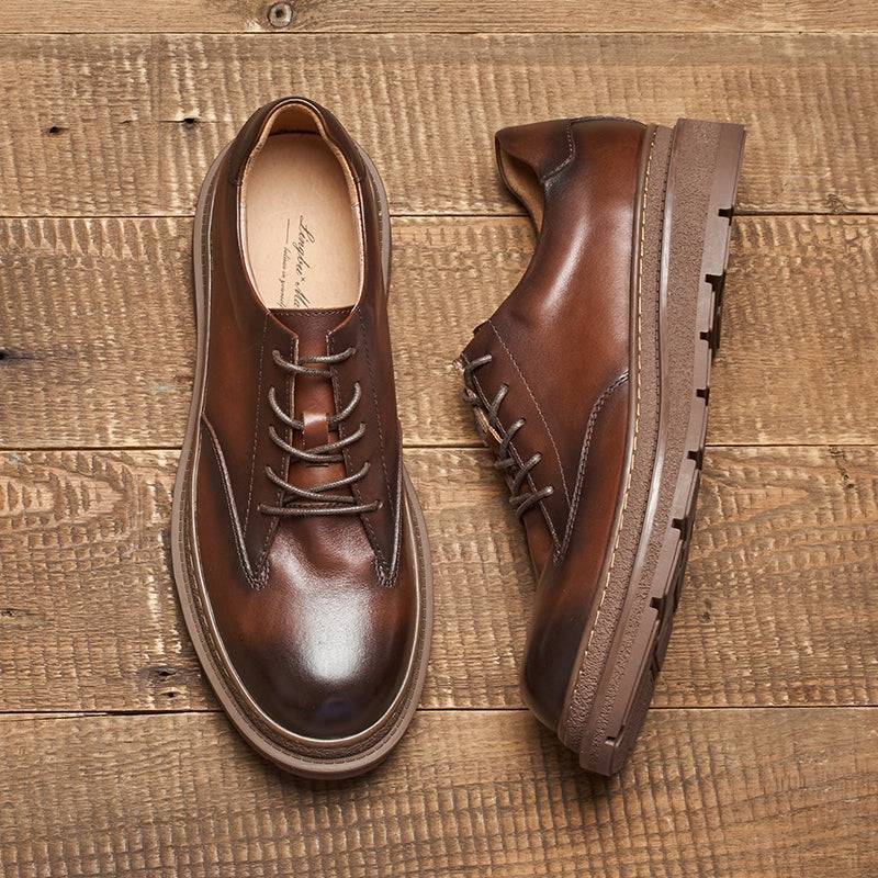 Men's lace-up leather work boots in various styles5