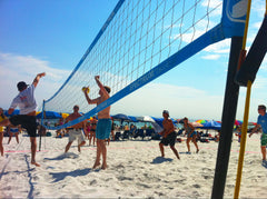 Volleyball game on beach