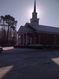Winter church cross shadow