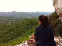 Enjoying the mountain view while hiking - stock photo