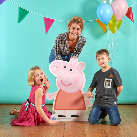 PEPPA PIG CARDBOARD CUTUT IN PARTY ROOM WITH FAMILY