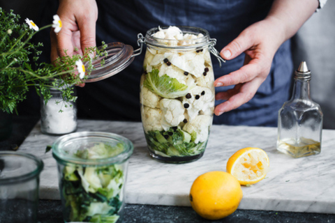 A person pickling Christmas leftovers