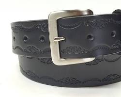 Close-up photo of a black leather belt with a snap buckle