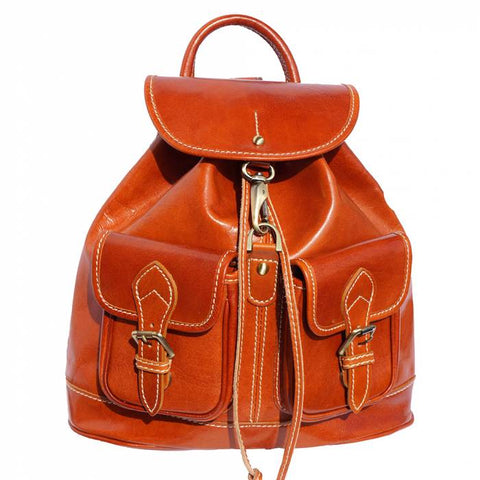 Light brown backpack with a rich leather patina