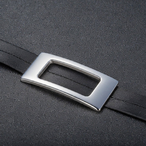 Image of a sleek silver buckle tailored for wearing with a dress belt