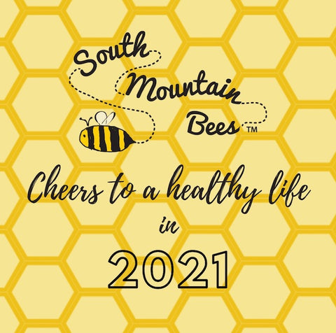 on a honeycomb background there's the South Mountain Bees logo  and "Cheers to a healthy life in 2021".