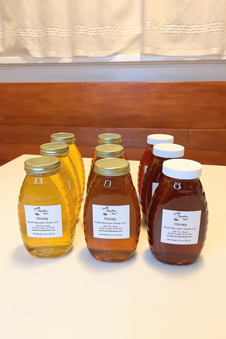 9 jars of honey in 3 different colors submitted to the New Jersey Honey Show.
