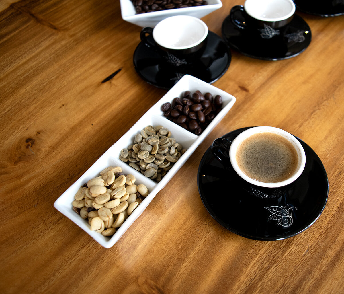 Samples of the Kona Coffee &amp; Tea 2019-2020 crop of Peaberry were cupped by coffee connoisseur Michael Cubbage. Pictured above are Kona coffee beans in parchment, green, roasted, and brewed forms. PHOTO: : Dayva Keolanui