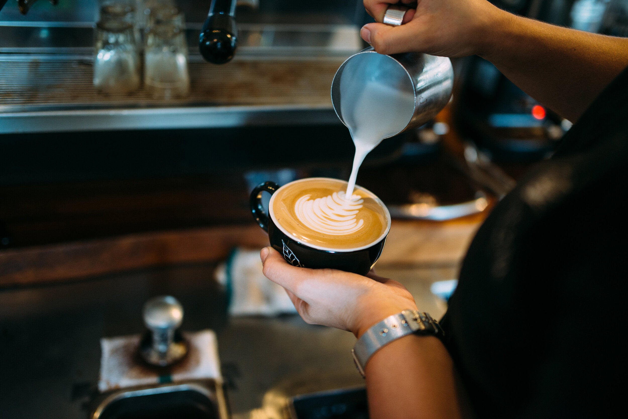 Along with being a great café manager, Margaret also makes a mean 100% Kona latté. PHOTO: Blake Wisz