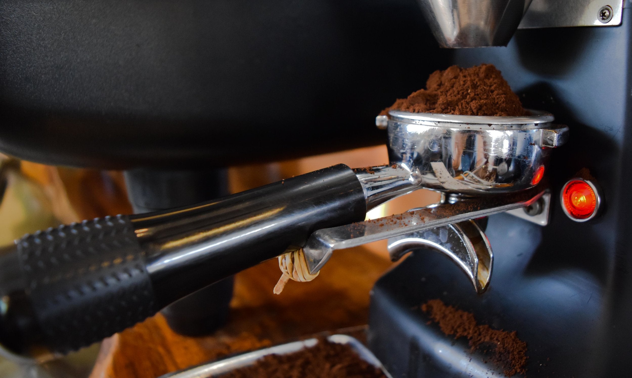 Finely ground coffee about to become espresso at our Kailua-Kona café. PHOTO: Dayva Keolanui