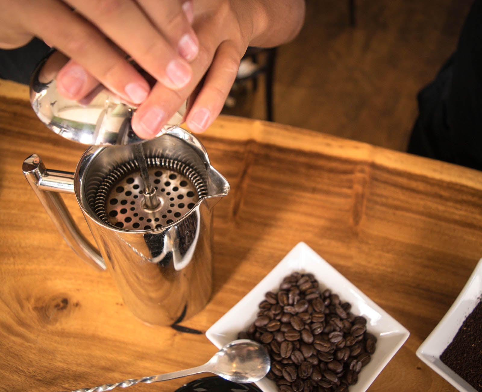 A French-press about to be pressed at our Kailua-Kona café. PHOTO: Dayva Keolanui