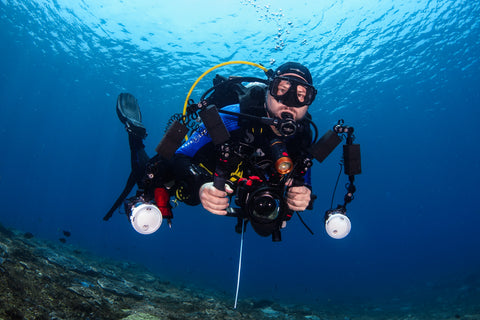 Jen's scuba diving buddy scuba diving.