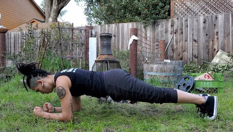 V doing a plank.