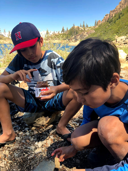 Susan's two sons eating nutella.