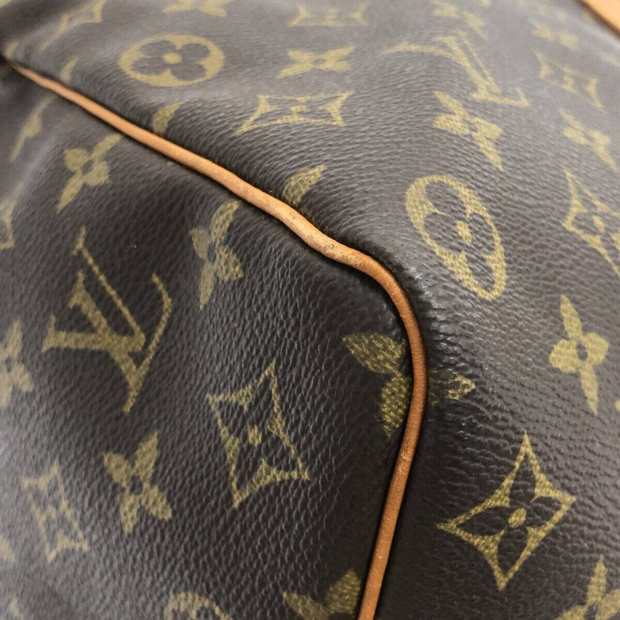 LOUIS VUITTON Monogram Evasion Brown Boston Travel Bag - 30% Off