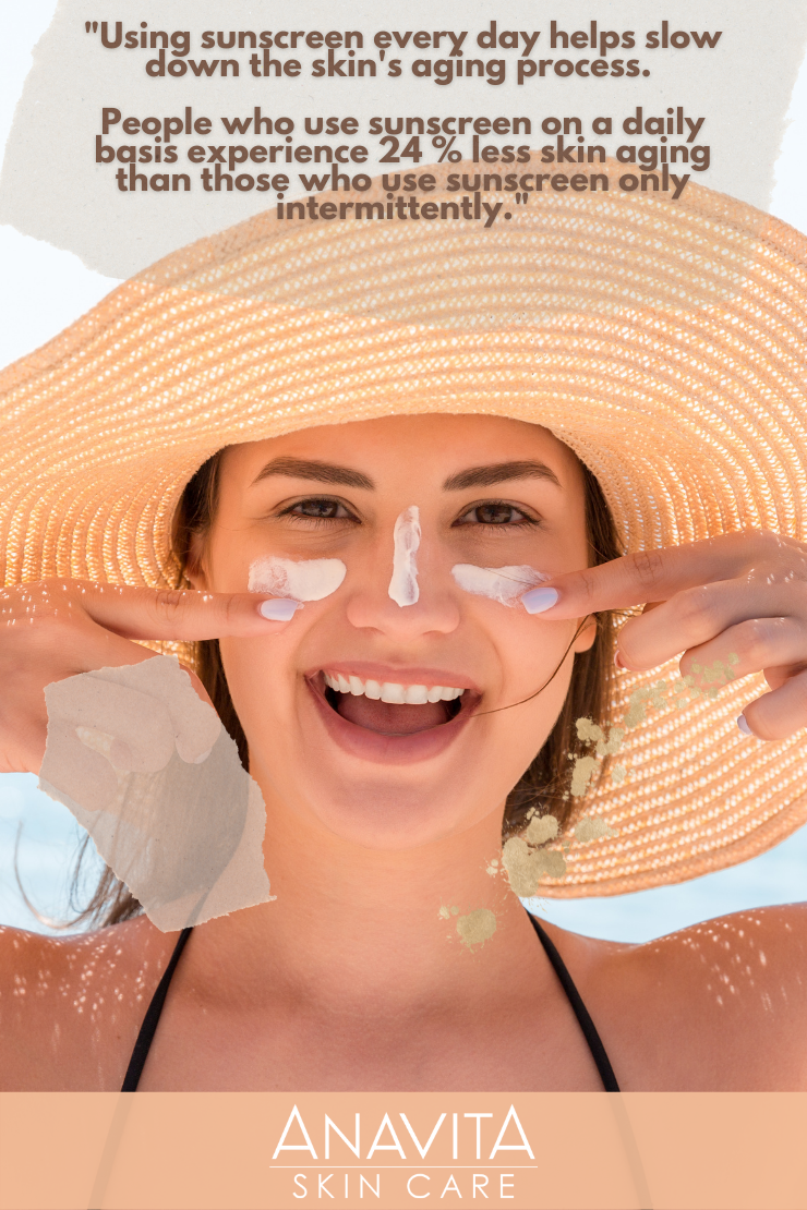 woman smiling with anti aging sunscreen on her face