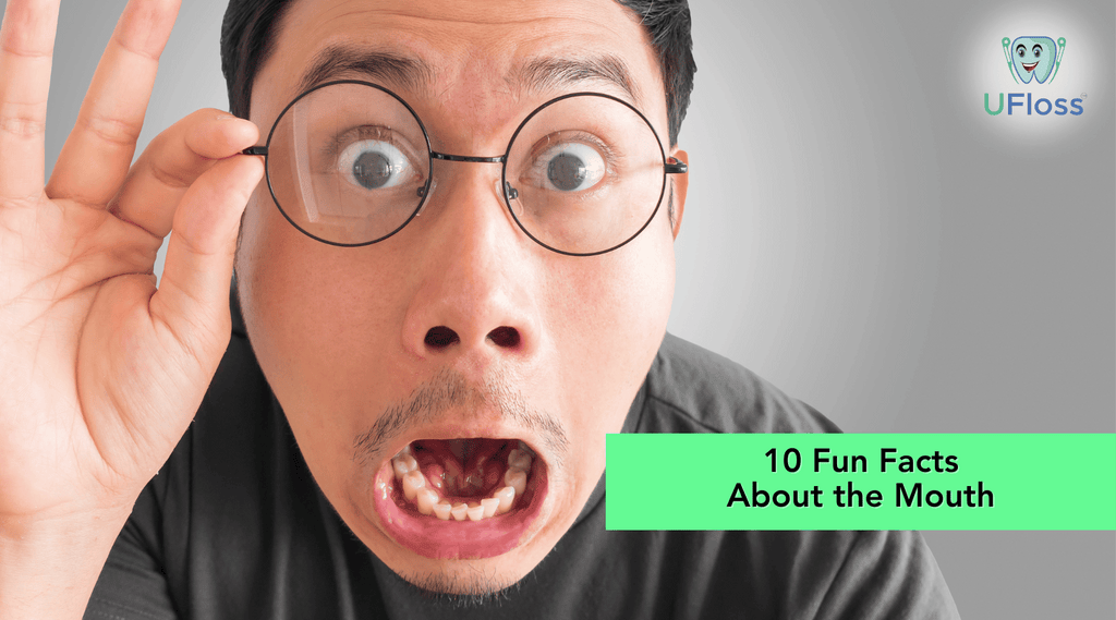 Asian man with grabbing glasses making an open-mouthed, funny surprised face