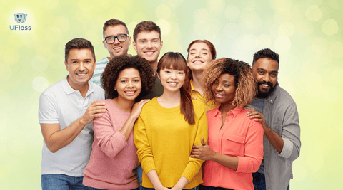 Men and women of different ethnicities showcasing their unique smiles