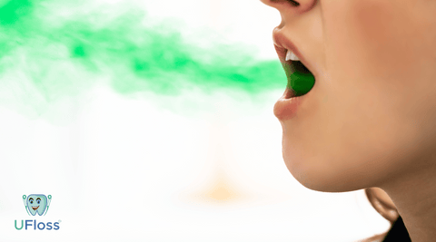Woman in profile with mouth open emitting green steam, suggesting bad breath