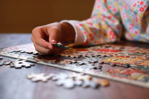 A child doing a puzzle