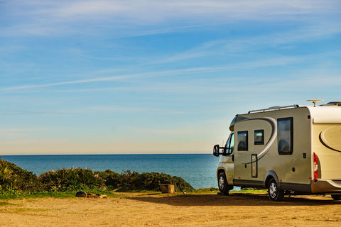 Campervan parked by the ocean