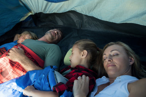 Family sleeping in a tent in Australia