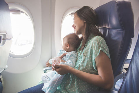 Mum with baby on the plane