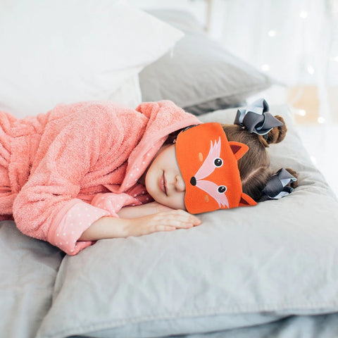 Kid sleeping with 2-in-1 Earphones and Sleeping Mask