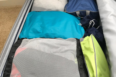 use of travel cubes in luggage