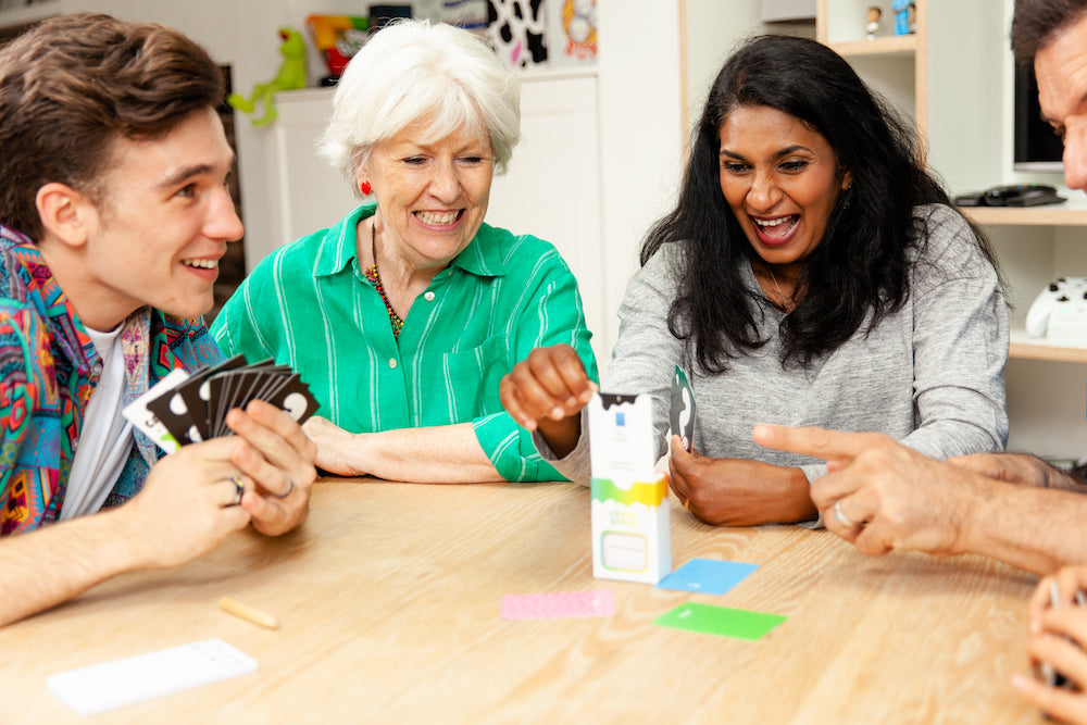 People playing Colourbrain around a table