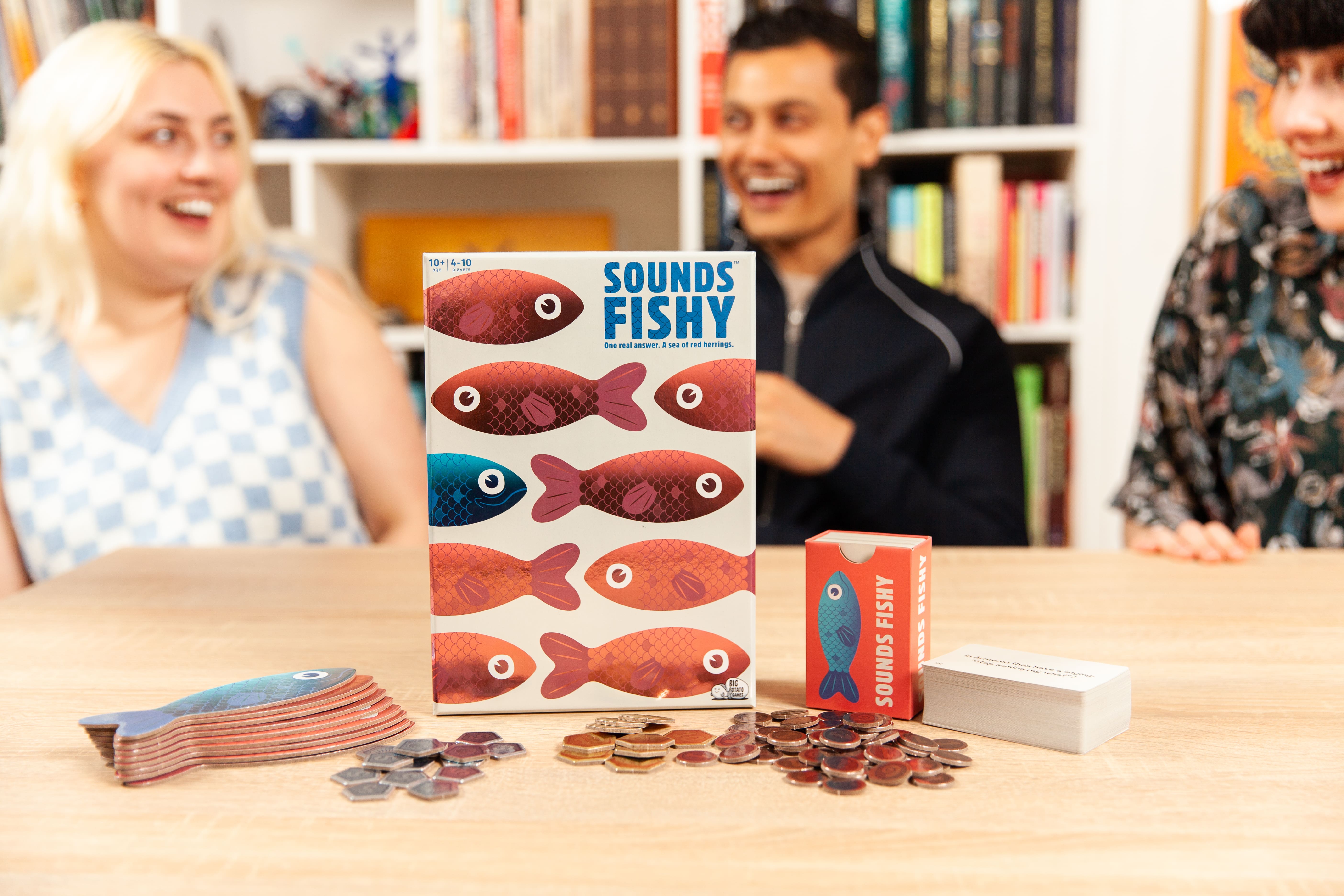 Sounds Fishy game box with people laughing in the background