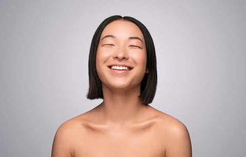 Model enjoys the natural scent of vegan deodorant