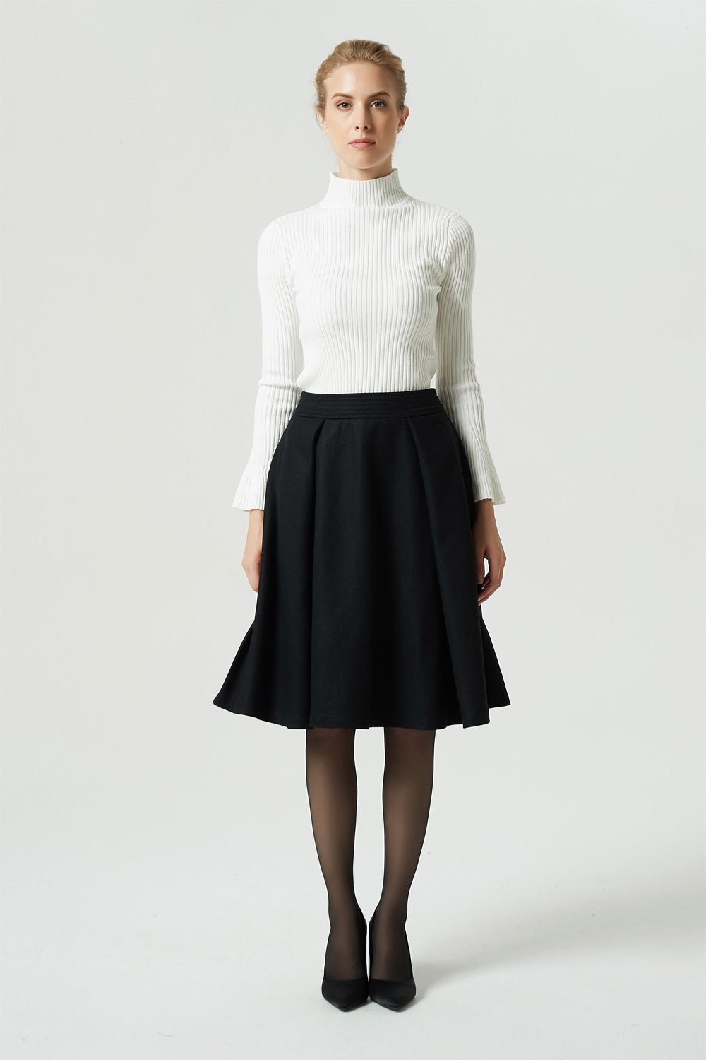 knee length black wool skirt, pleated 