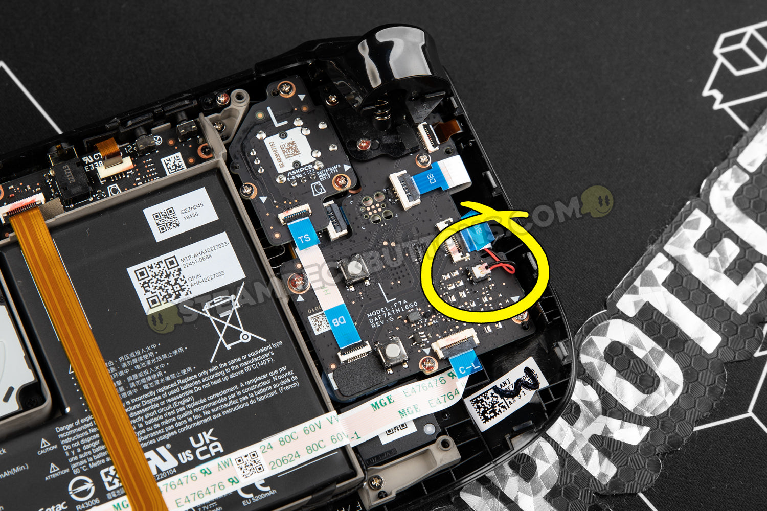 Image showing the inside of a Steam Deck. Circled location of the power connector for the dpad side of the Steam Deck