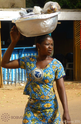 A young woman with her March 8th, International Woman's Day outfit in the streets of Ouagadougou, Capital of Burkina Faso