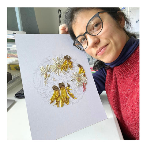 Emy Oikawa, the clay artist, holding 'My Floral Sunshine' during the early stages this collaboration piece..