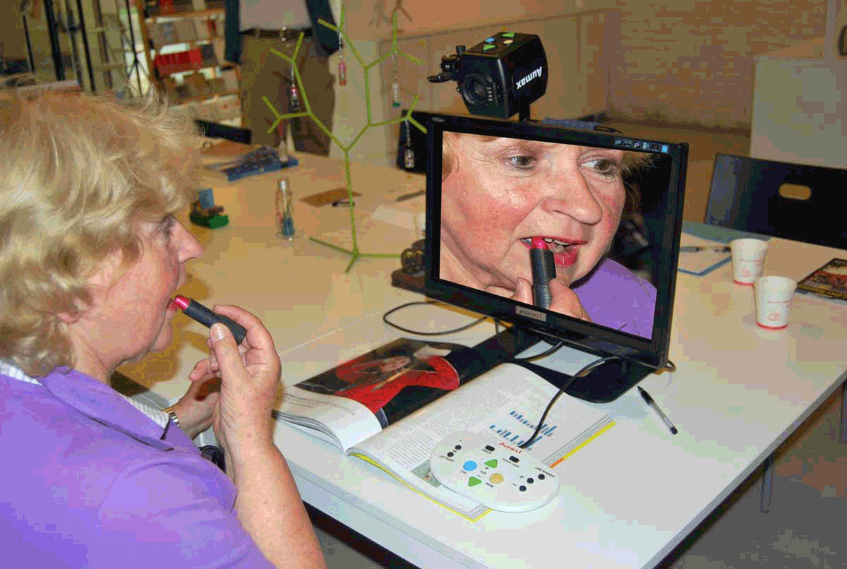 digimax lady applying lipstick