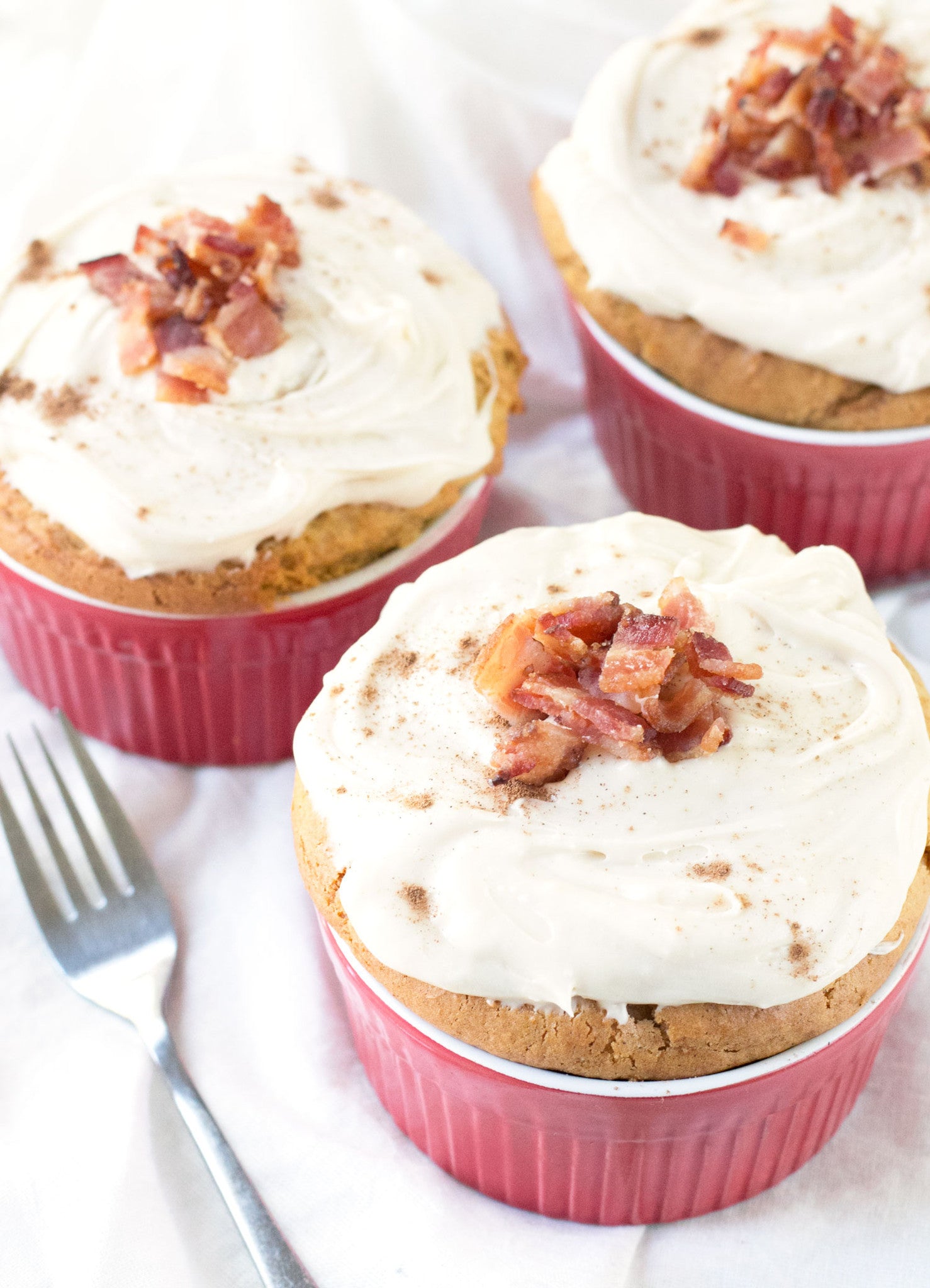 Individual Pumpkin Spice Cakes with Cream Cheese Frosting and Candied Bacon | Sauce + Style