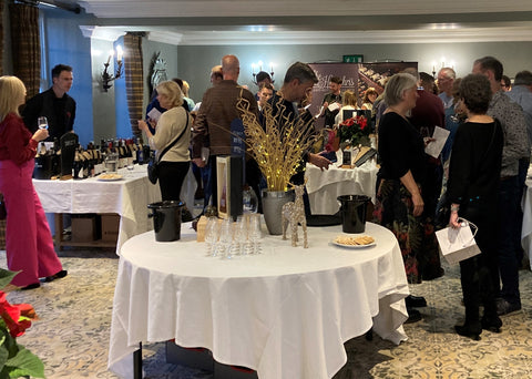 A&H Wine Fair in full flow with guests around Paul's table