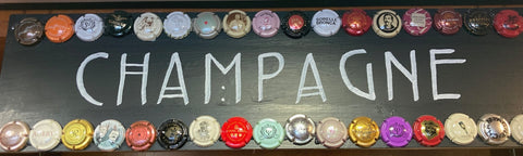 Champagne sign decorated with Champagne caps